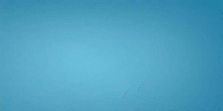 A single dolphin leaps gracefully out of the clear blue water, silhouetted against a vibrant sky.