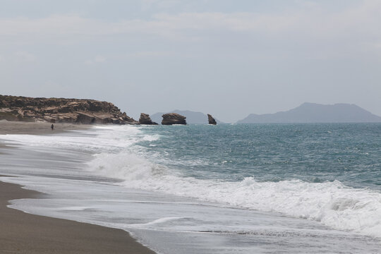 Waves at Triopetra Beach with the famous Three Rocks, Crete, Greece