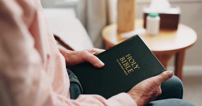 Bible, hands and senior person in bedroom for morning prayer, worship study or Christian faith in home. Reading, religion and elderly pensioner with holy book, gospel or spiritual guide in house