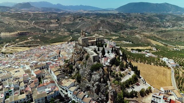 Aerial circling shot of Olvera Castle and white town, Cadiz, Andalusia