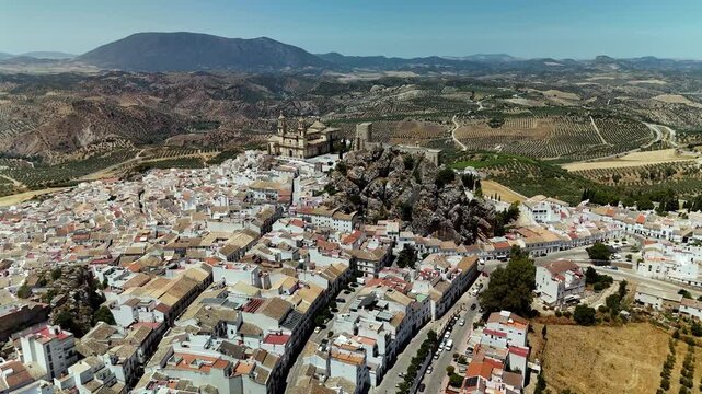 Aerial drone view of Olvera Castle and hilltop white village, Cadiz, Spain