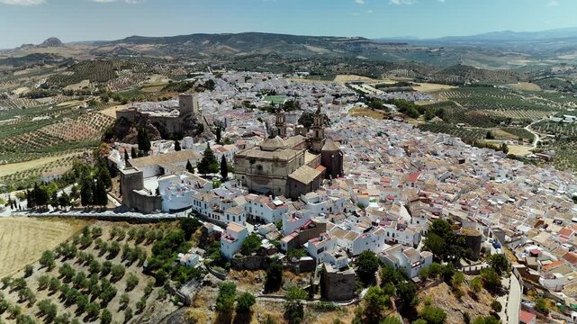 Aerial view of Olvera church and white houses, Cadiz, Andalusia, Spain