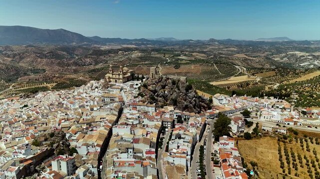 Aerial drone view of Olvera hilltop town and castle, Andalusia, Spain
