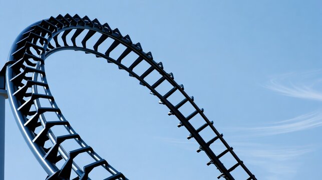 uriel. An empty roller coaster track curving sharply downwards against a blue sky. real-estate listings, architecture portfolios, designed for interior renovation comparisons for interiors.