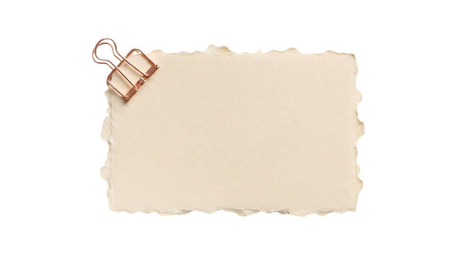 A blank piece of textured paper with a rose gold binder clip isolated on transparent background