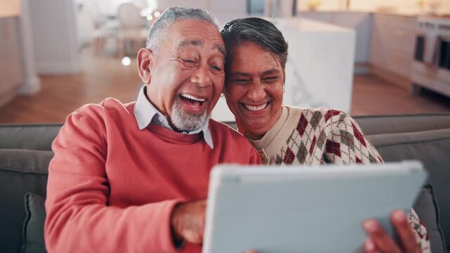 Senior, sofa and happy couple with tablet for funny joke, comedy or online entertainment in home. Elderly, man and woman with smile, laughing or technology for humor, network or subscription in house