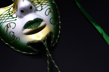 mardi gras carnival masks on black background  © Adriana