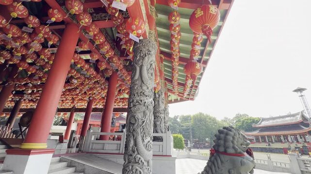 Beautiful red lanterns under the traditional roof of Sam Poo Kong, chinese temple in Semarang Indonesia