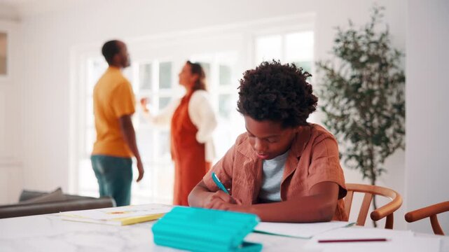 Child, homework and parents fight in house with stress, writing task or distraction from learning. Sad, African boy and education disruption in home with conflict, mother and father argue for divorce