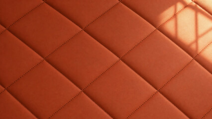 Obraz premium Puffy quilted vinyl surface in warm terracotta diamond pattern texture background