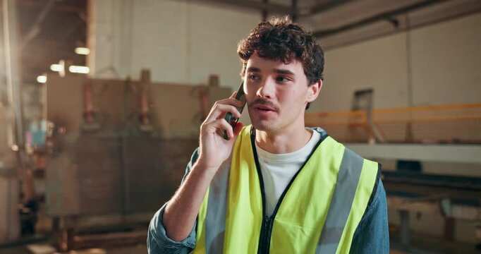 Carpentry, phone call and thinking with man in warehouse for feedback, report or update. Communication, contact and project management with person in woodworking factory for customer service