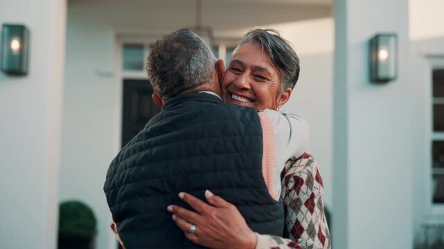 Senior, couple and welcome with hug at front door for home arrival, happy reunion and belonging. Retirement, woman and embrace husband outdoor at house for greeting, connection and comfort in return