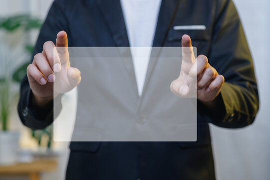 Professional Businessman in Suit Using Touchscreen Interface in Office Environment
