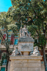 Obraz premium Neptune Fountain featuring the seated Roman god of the sea holding a trident above four sphinx figures in Barcelona