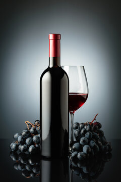 Red wine and juicy blue grapes.