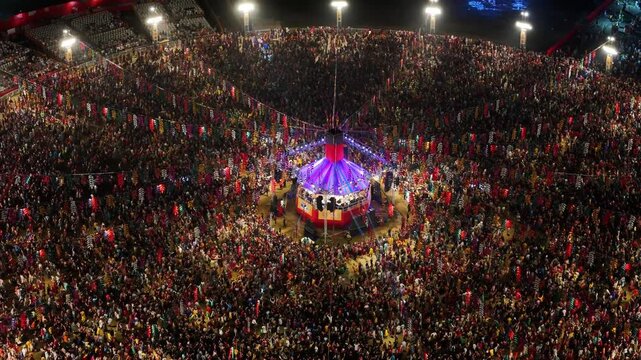 Scenic Aerial View of United Way of Baroda Grand Garba Celebration, World's Largest Garba Festival, Thousands of Dancers in Traditional Attire, Vibrant Navratri Celebration, Colorful Cultural Event an