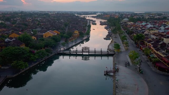 Time lapse of timelapse of aerial drone view of Hoi An city, Quang Nam province, Vietnam. Panoramic footage of Ancient town, UNESCO world heritage. One of the most travel popular touristic destination