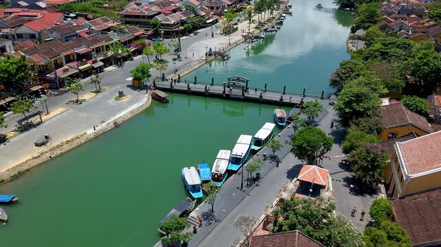 Time lapse of timelapse of aerial drone view of Hoi An city, Quang Nam province, Vietnam. Panoramic footage of Ancient town, UNESCO world heritage. One of the most travel popular touristic destination