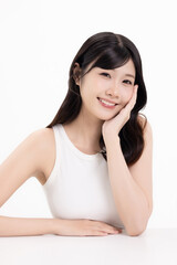 Fototapeta premium Portrait of beautiful Asian young woman with clean fresh skin isolated on white background. Beauty skincare concept.