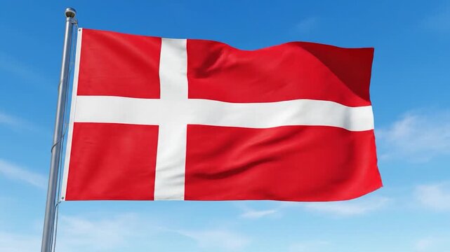 The national flag of Denmark waves against a blue sky