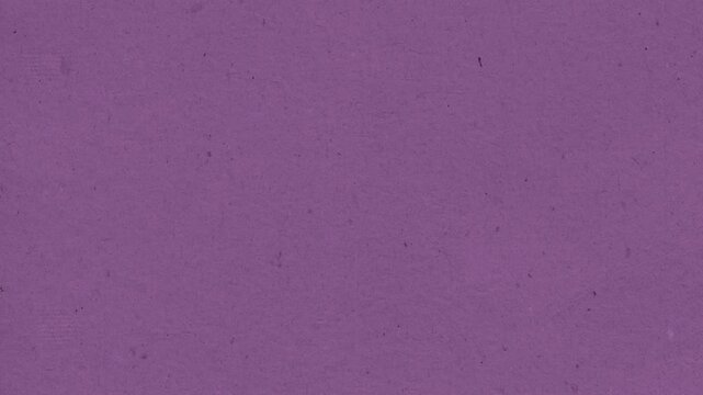 Purple textured paper surface background showing subtle motion grain in this seamless digital animation loop footage