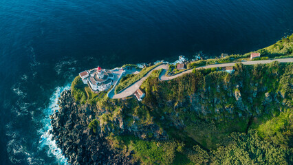 Farol do arnel lighthouse on sao miguel island coast © Alberto