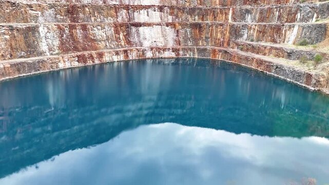 Aerial View of the Abandoned Mary Kathleen Uranium Mine Open Pit with Vibrant Blue Water, Outback Queensland Australia