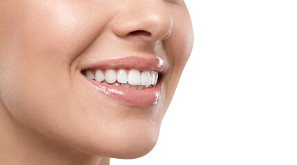 Naklejka premium Close-up of a woman's perfect, white smile with glossy lips on a white background