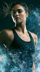Fototapeta premium Athletic woman with sweat and water splashes, intense workout and determination