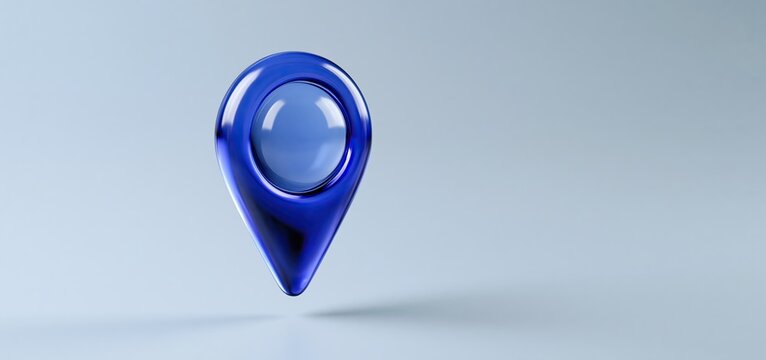 A glowing cobalt blue map pin hovers against a smooth gradient background, representing travel and digital navigation.