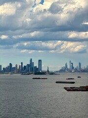 Fototapeta premium The Statue of Liberty and the New York City Skyline
