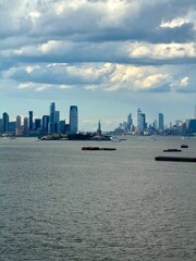 Fototapeta premium The Statue of Liberty and the New York City Skyline