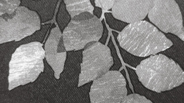 close up of black and white jacquard fabric with leaf pattern