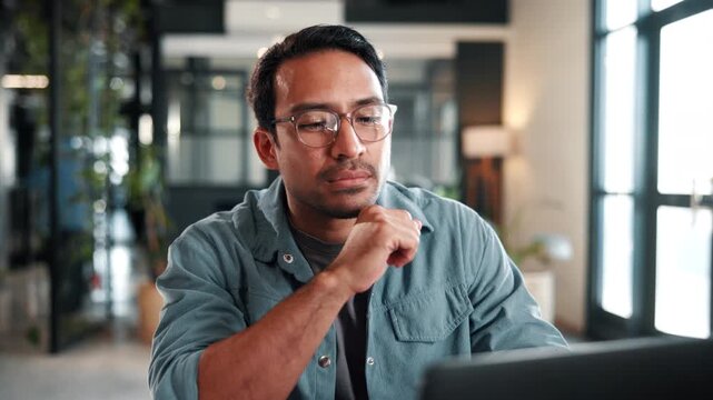 Laptop, typing and businessman in office with thinking, planning or decision on software development. Ideas, computer and web designer on programming project with online research in workplace.