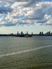 Fototapeta premium The Statue of Liberty and the New York City Skyline