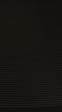 Opening and tracing curved lines in a dark scene with subtle light reflections