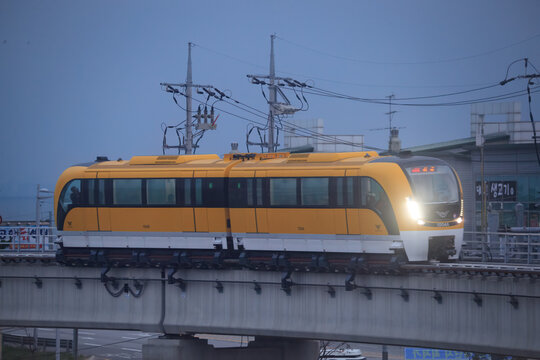 The yellow Incheon Airport Maglev train on a viaduct on November 2, 2017 in Incheon, South Korea.