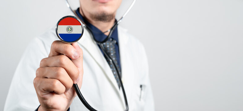 Paraguay healthcare system, Paraguayan national healthcare concept. Hand of doctor holding stethoscope