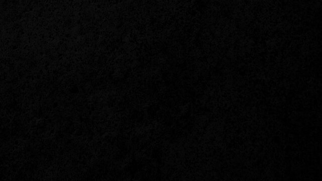 Texture of velvet black paper. Surface of black rough paper, slowly rotating.
Abstract stop-motion video of dark black felt or wool fabric texture. Scratches and dust dark grunge paper background.