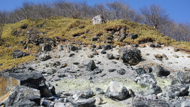 Sulfur-stained rocks in the volcanic landscape of Sesshoseki, Nasu