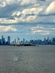 Fototapeta premium The Statue of Liberty and the New York City Skyline