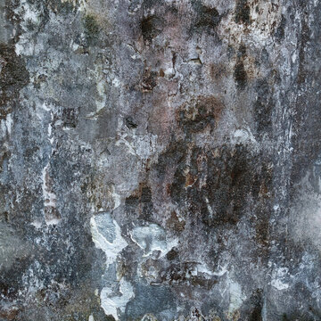Old concrete wall with stains and weathered surface. Grunge background texture.