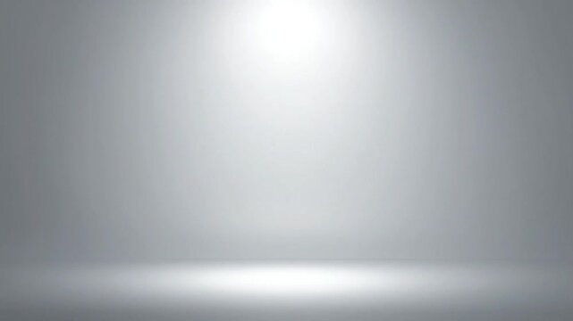 A minimalist studio background with soft lighting and a smooth gradient