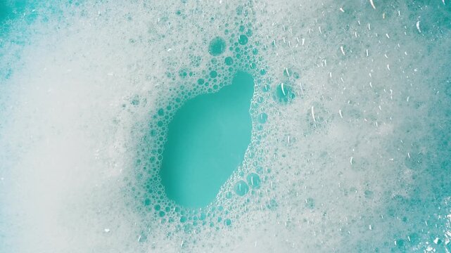 soap foam isolated on black background, detailed bubble texture for cleaning