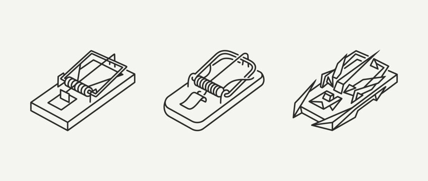 Three classic wooden mouse traps with metal spring mechanisms