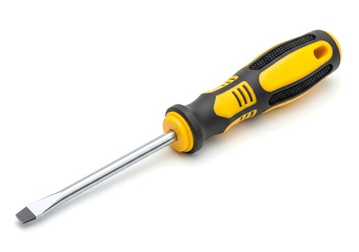 Professional flat head screwdriver with an ergonomic yellow and black handle for household repairs maintenance and construction work isolated on white