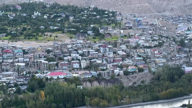 Indus river and Kargil City with Himalayan mountains, Jammu and Kashmir, India. Kargil town in the state of Jammu and Kashmir, Ladakh.