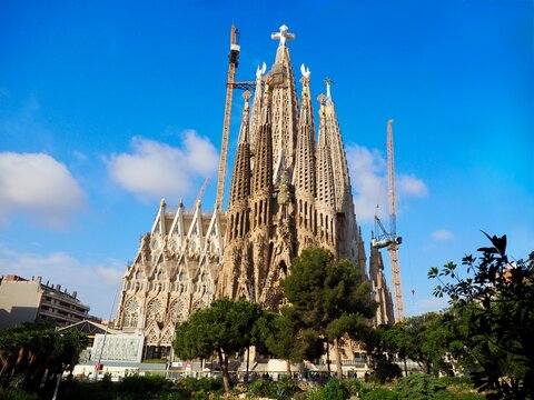 Famous European Cathedral with Gothic Architecture Under Blue Sky
