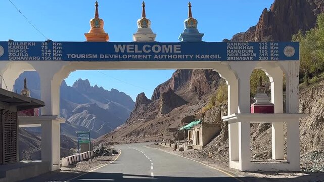 Ladakh Leh Kargil Srinagar National Highway. Travel on car on road of Ladakh Himalaya mountains. Roadtrip landscape. leisure driving under a high, rocky mountain road. landslide prone area. 