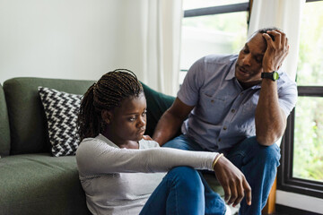 Concerned conversation in dim room. © Rawpixel.com